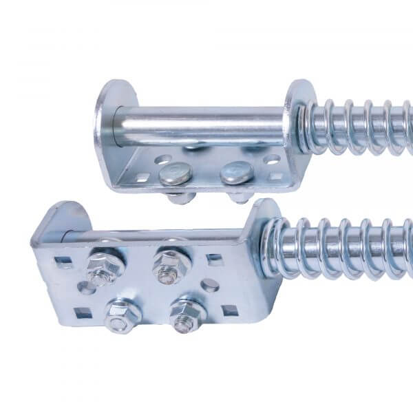 Les butoirs à ressorts permettent d’amortir le tablier d’une porte sectionnelle industrielle en position ouverte et de garder la tension des câbles de levage