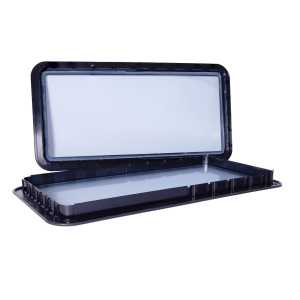 Hublot industriel pour porte sectionnelle industrielle ouvert en deux parties intérieure et extérieure